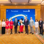 Attendees at the signing of the Memorandum of Understanding Between Cathay and Hong Kong Disneyland Resort at Hong Kong Disneyland Hotel