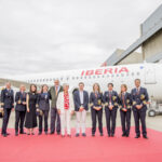 Iberia staff in front of the new plane named after Bettina Kadner.
