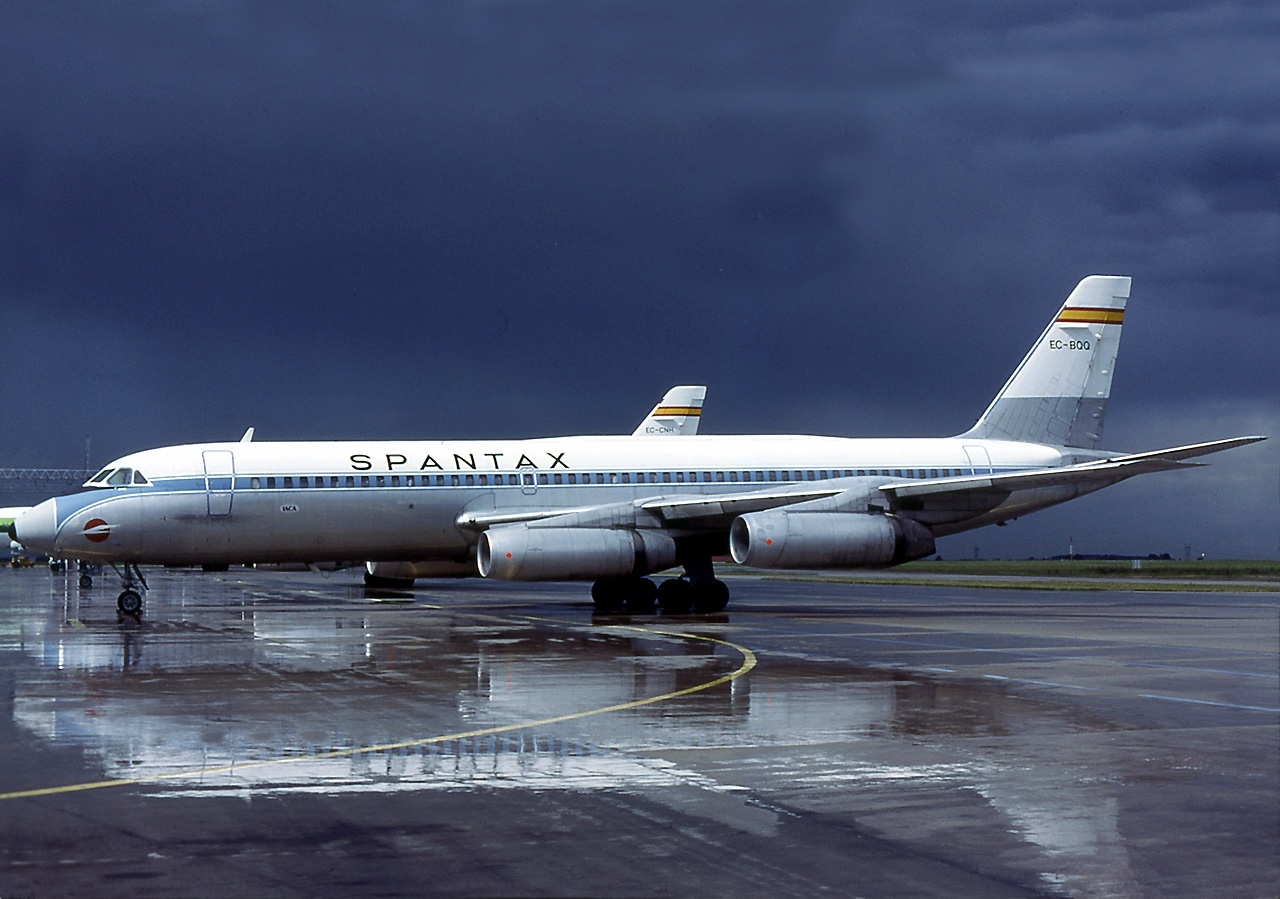 An aircraft for now-defunct airline Spantax on the tarmac after rain at the airport.