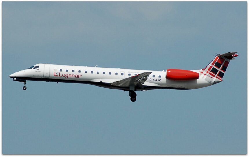 A Loganair flight, with its iconic tartan tail, takes off from Manchester airport.