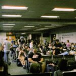 Travellers waiting in an airport