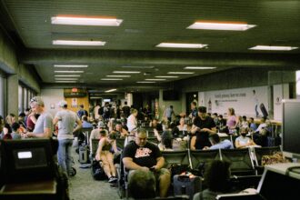 Travellers waiting in an airport