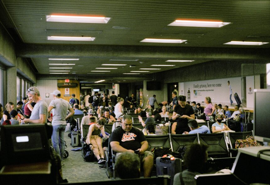 Travellers waiting in an airport