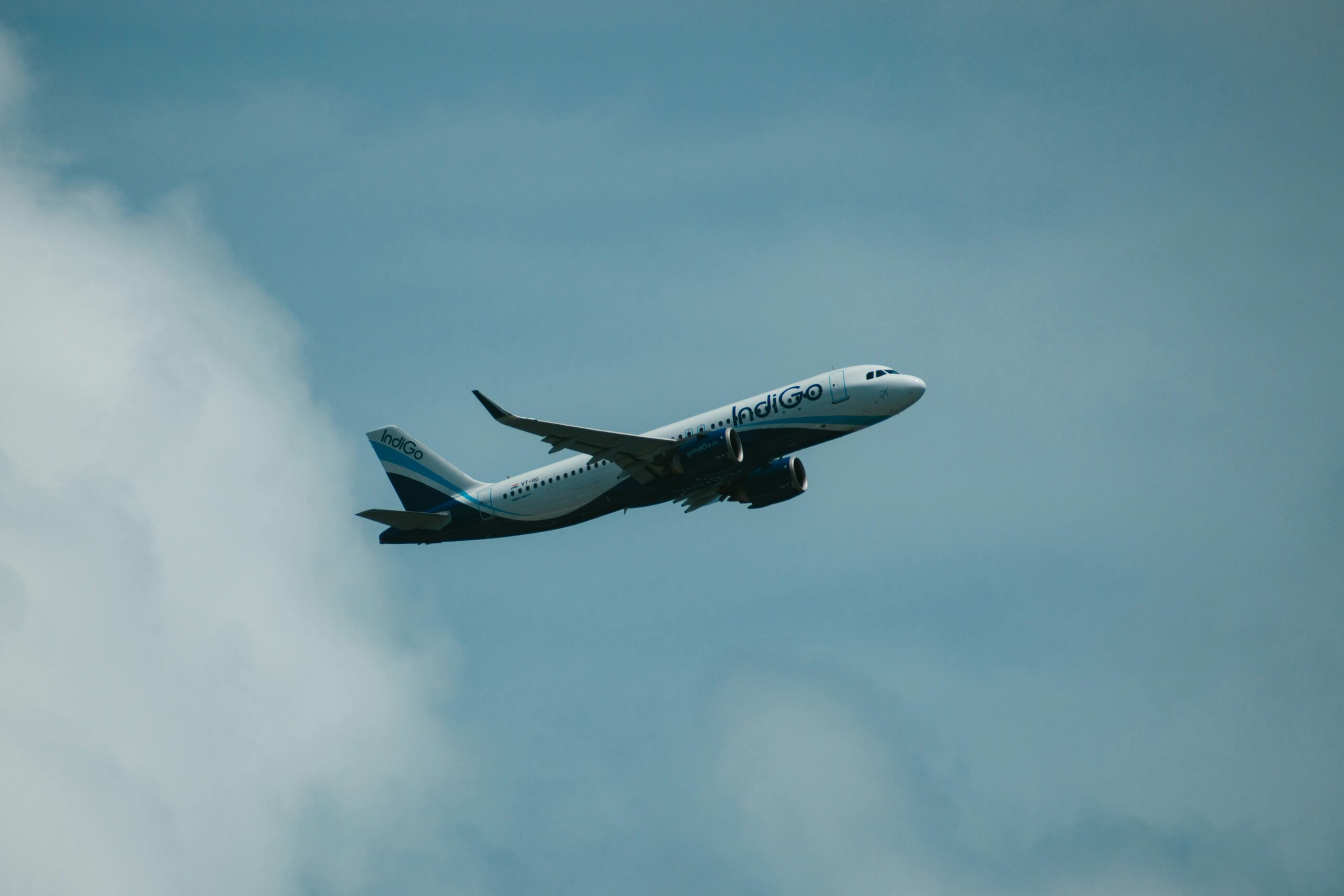 IndiGo aircraft flying in the sky