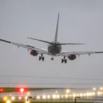 A picture of an aeroplane struggling to land during storm Amy 2025