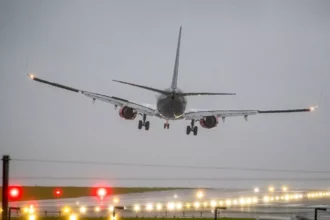 A picture of an aeroplane struggling to land during storm Amy 2025