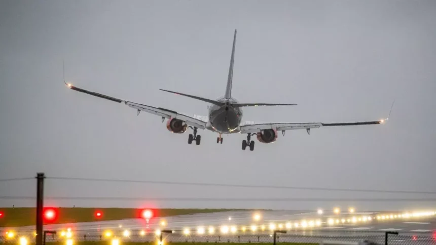 A picture of an aeroplane struggling to land during storm Amy 2025