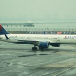 Delta Aircraft standing in the runway