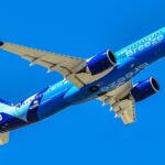 Breeze Airways Airbus A220-300 climbing after takeoff under clear skies, showcasing the carrier’s focus on Airbus A220 efficiency and fleet expansion within Breeze Airways A220 fleet growth to reach underserved U.S. routes.