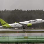 aircraft take off from the airport runway and starts flying