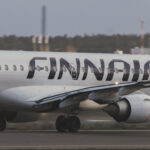 Flight AY915 on the runway at Helsinki Airport