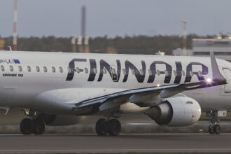 Flight AY915 on the runway at Helsinki Airport