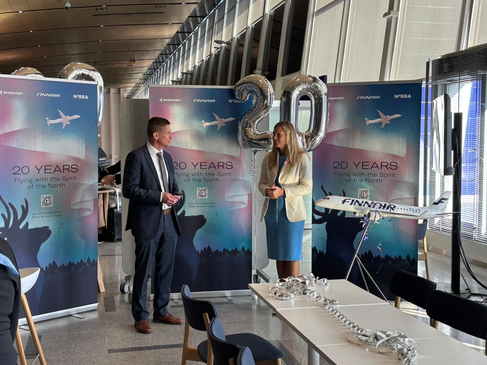 Norra's Juha Ohala and Embraer's Marie Louise Philippe at the event