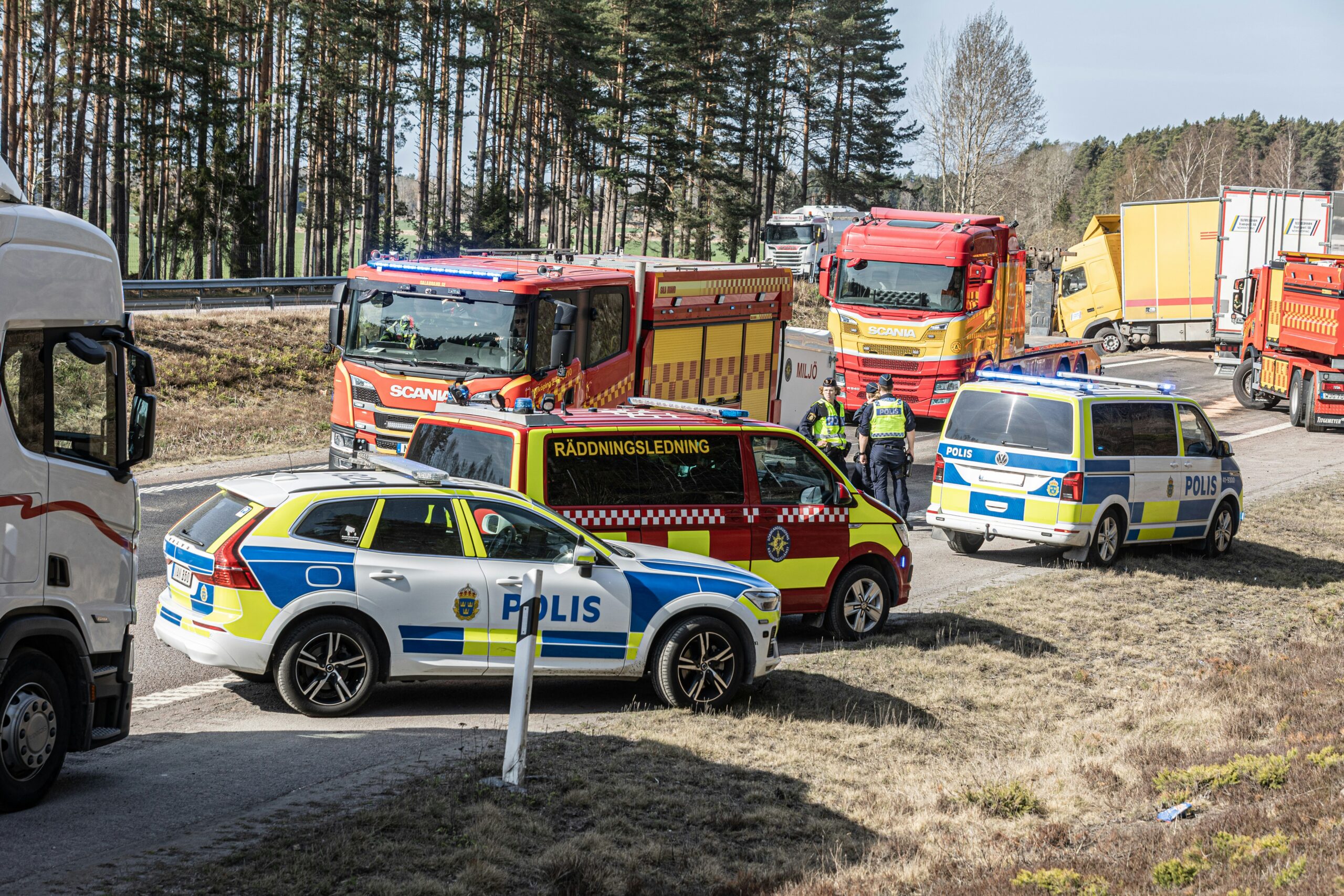 Police and Firetrucks on Highway