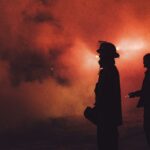 Firefighter Silhouette through smoke