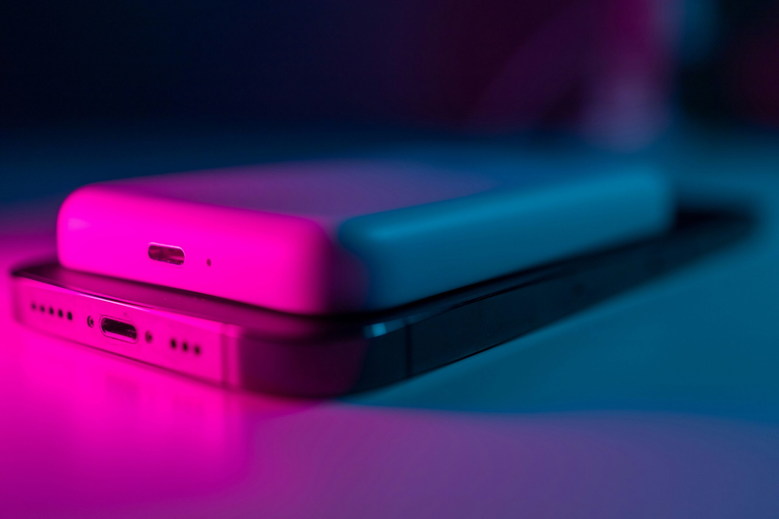 Power bank and Phone laid down on flat surface