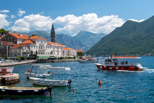 Scenic view of Montenegro’s Bay of Kotor with boats docked near Perast, a top highlight among the best places to visit in Montenegro, attracting travellers through Montenegro flights to Tivat and Podgorica.