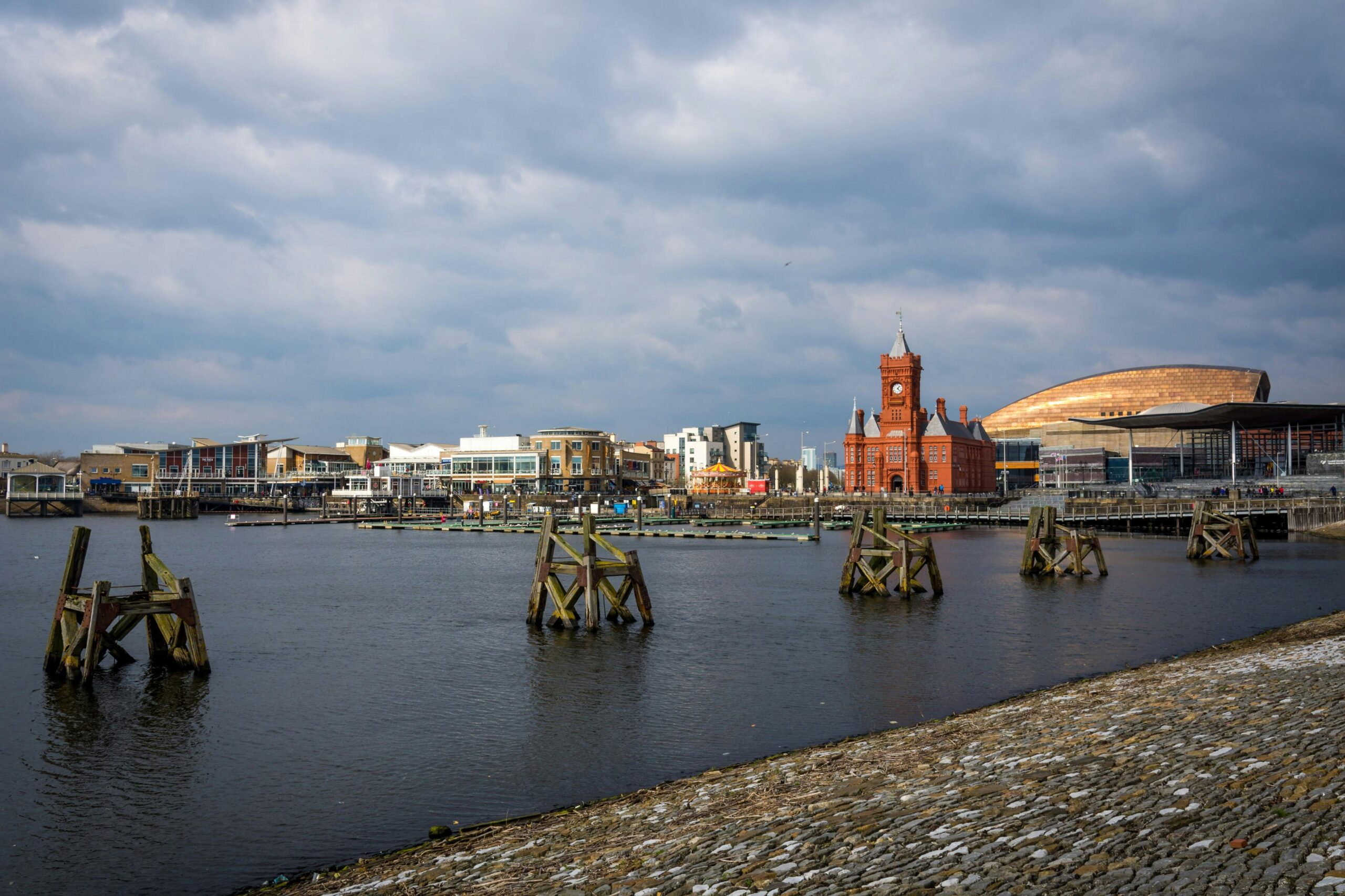 A view of Cardiff Bay with many iconic buildings visibile such as the Senedd.