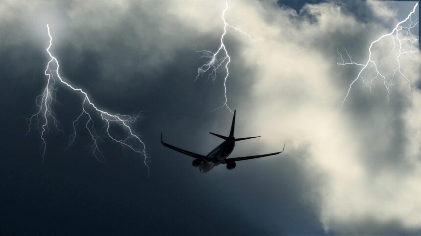 Commercial airplane flying through a thunderstorm with multiple lightning strikes, illustrating airplane lightning strike, lightning safety, and aircraft design.