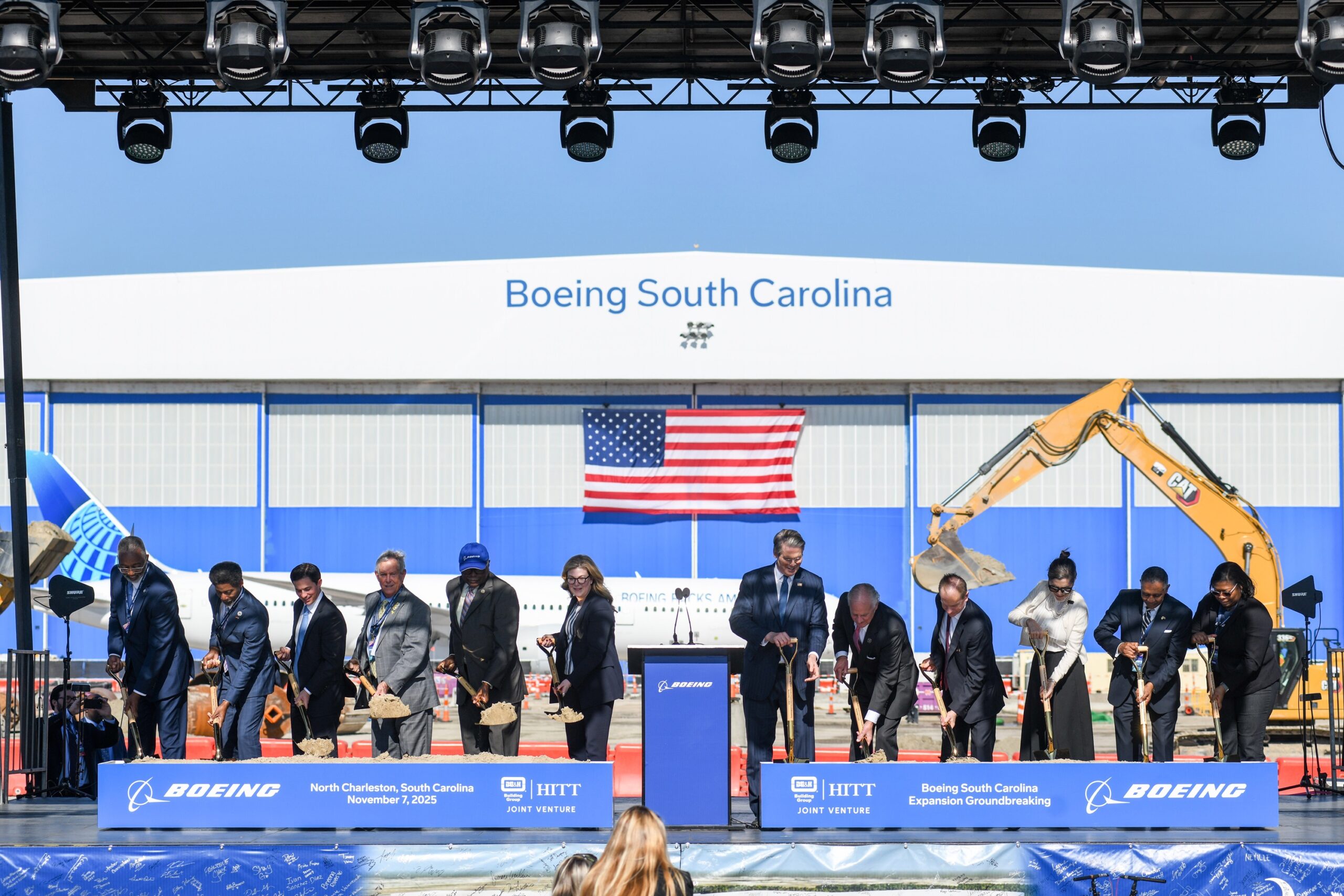 Boeing authorities standing in the podium