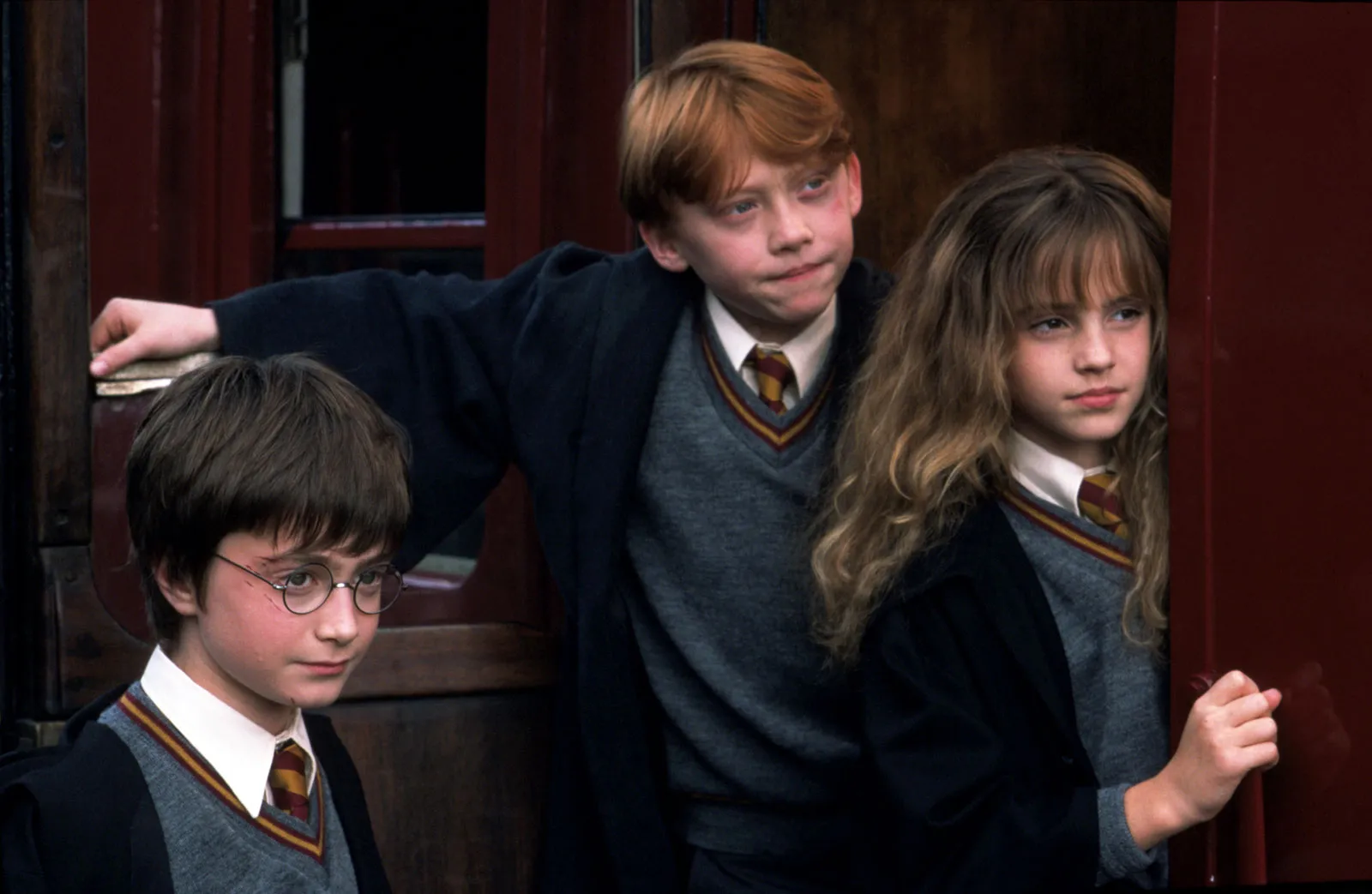 A photo of Daniel Radcliffe, Rupert Grint and Emma Watson from the film Harry Potter and the Philosopher's Stone