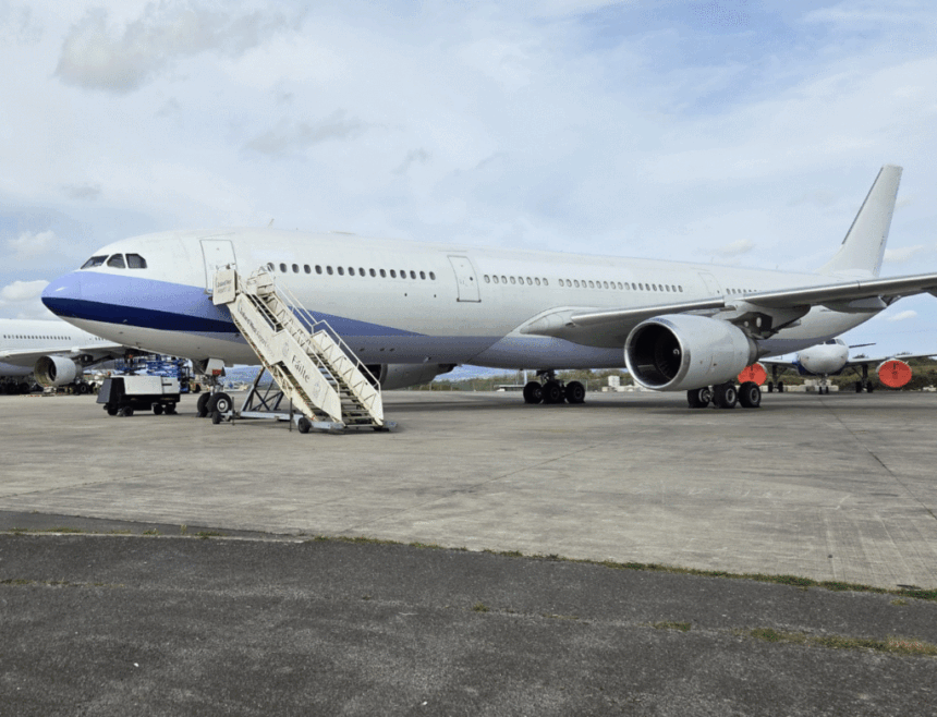 Two aeroplanes getting ready for dismantling