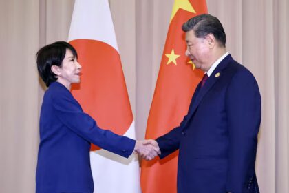 Japanese Prime Minister Sanae Takaichi shakes hands with Chinese President Xi Jinping ahead of their talks in Gyeongju, South Korea, October 31, 2025. Kyodo/via REUTERS/File Photo