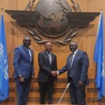 Uganda’s delegation poses at ICAO headquarters as Hon. Katumba Wamala congratulates Kabbs Tijuke on his designation to the Uganda ICAO Council 2025, reflecting progress in Uganda aviation and recent Uganda international air service agreements 2025.