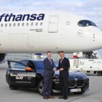 Photo of the two CEO from Lufthansa and SIXT shaking heads over their new partnership.