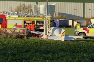 Emergency services attending the crash site at Sherburn Aero Club