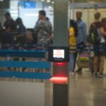 a boarding pass scanner ©Arshad Pooloo