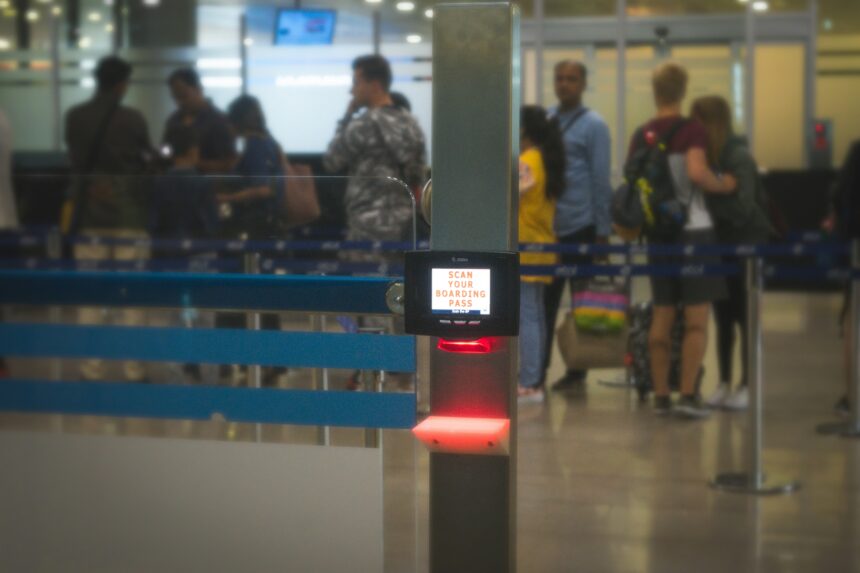 a boarding pass scanner ©Arshad Pooloo