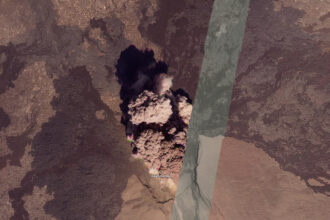 Satellite image of the beginning of Hayli Gubbi's eruption this morning