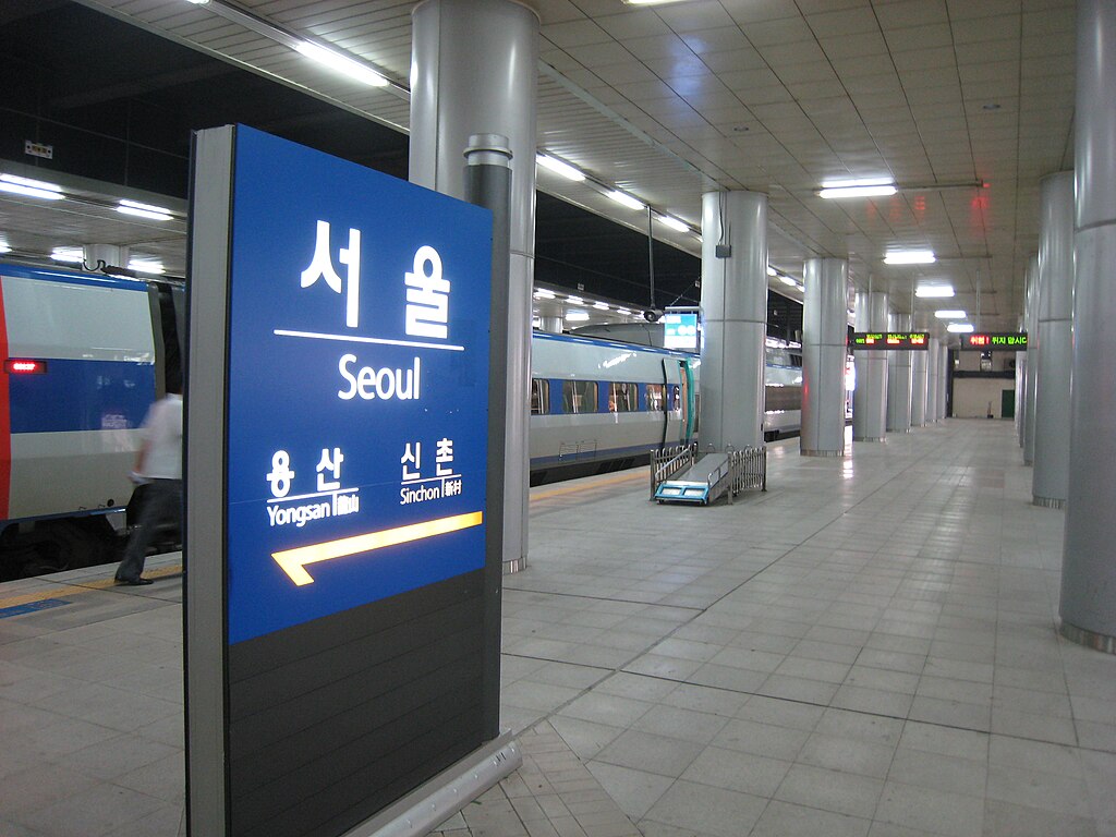 Board in the railway station carrying the name of the city