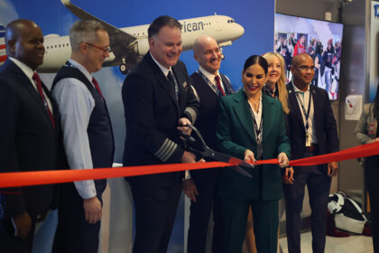 Captain Josh Hall, Managing Director of JFK Sylvia Rodriguez and the flight crew of Flight 3 cut the ceremonial ribbon to start boarding the inaugural flight of the Airbus A321XLR.