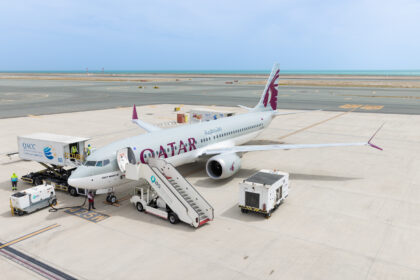 Qatar Airways 737-MAX aircraft stationed at an airport