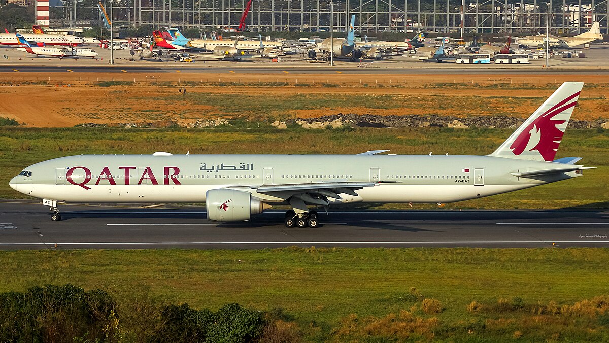 Qatar Airways aircraft stationed at an airport