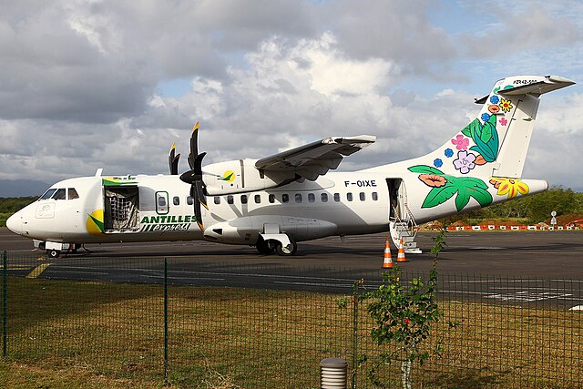 ATR-42-500, Air Antilles Express loading at an airport.