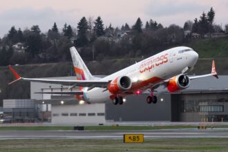 A Boeing 737-MAX 8 with Air India Express's logo taking off from Seattle.