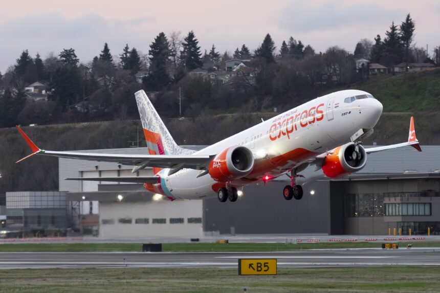 A Boeing 737-MAX 8 with Air India Express's logo taking off from Seattle.