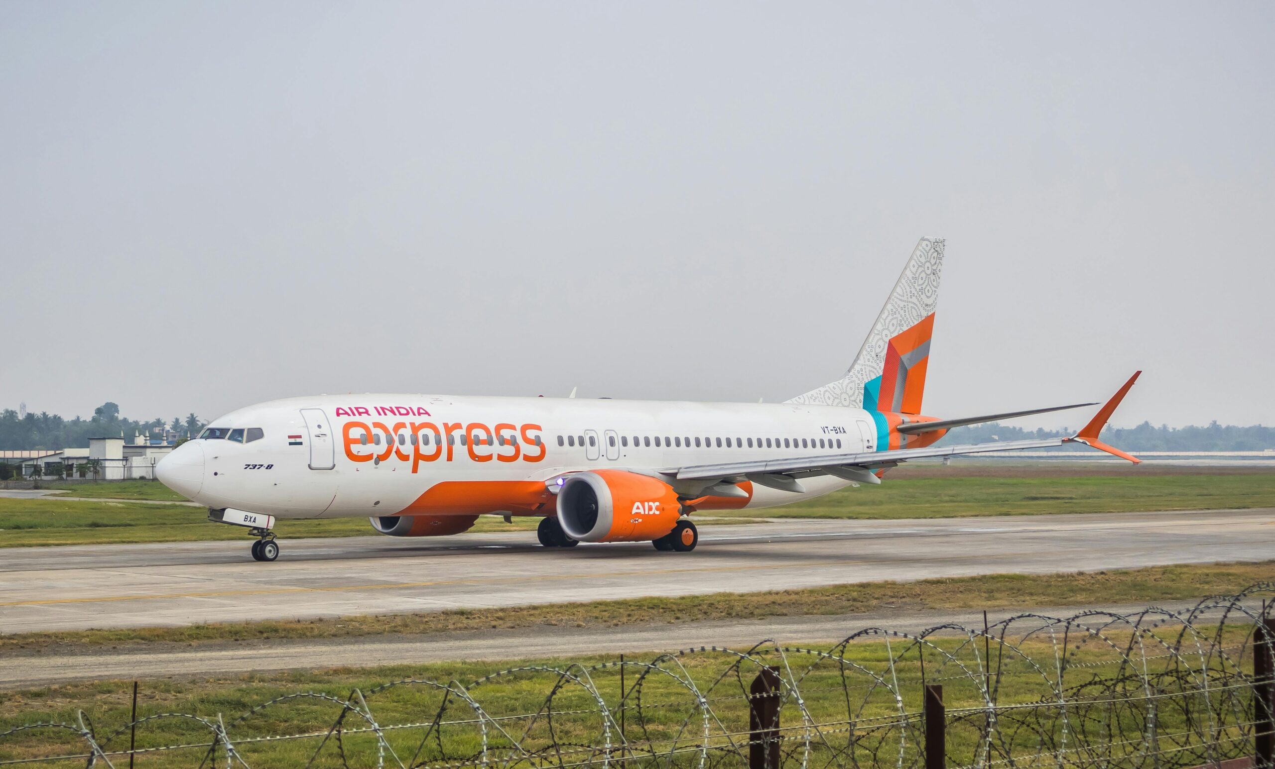 Air India Express Boeing 737-8 Max jet on the tarmac.