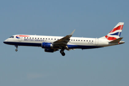 A British Airways plane with a Union Jack on the tail comes in for landing.