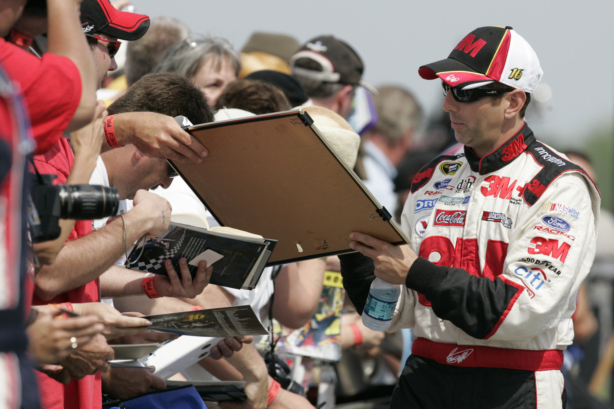 Greg Biffle signing autographs at Pocono Raceway  © Ford Racing