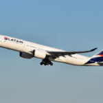A LATAM aircraft taking off into the sky.