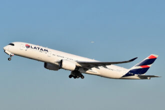 A LATAM aircraft taking off into the sky.
