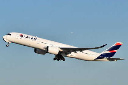 A LATAM aircraft taking off into the sky.