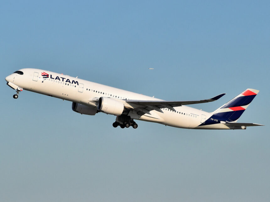 A LATAM aircraft taking off into the sky.