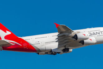 Airbus 380 from Qantas Airways flying in clear blue sky