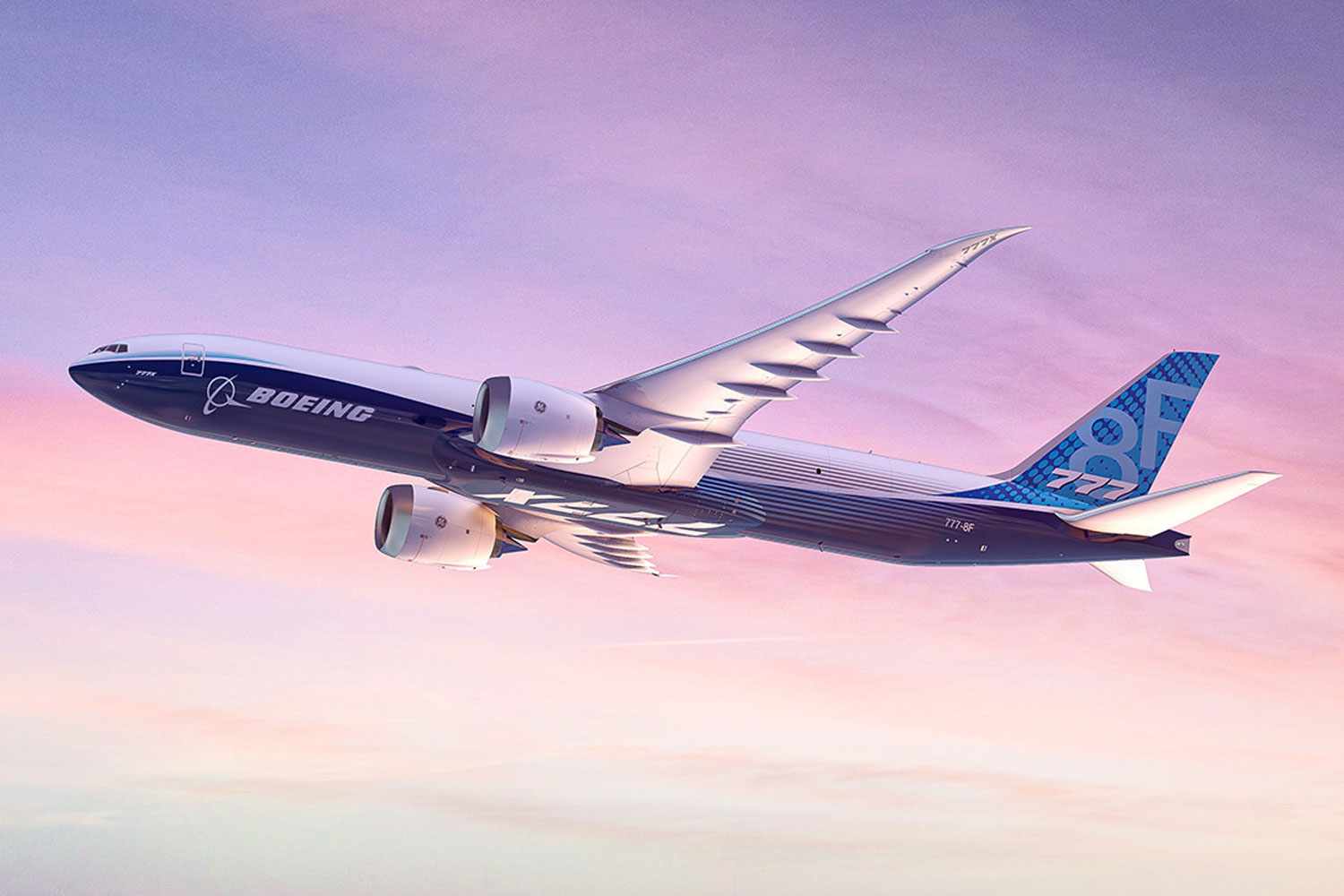 A commercial photo of Boeing's 777F aircraft in the skies at sun rise 