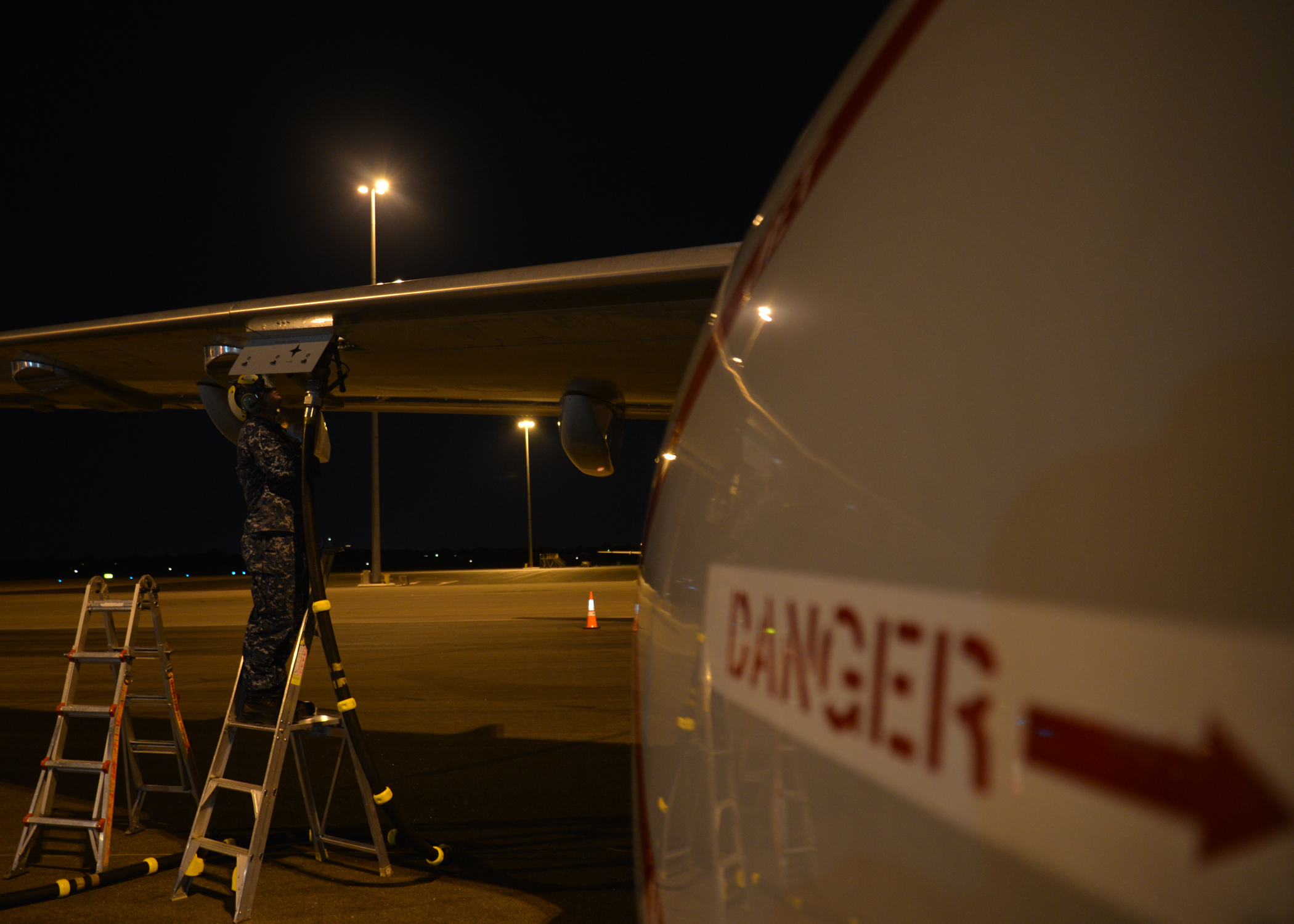 U.S. Navy crew working at night during early Malaysia Airlines MH370 search efforts, ahead of the renewed MH370 search 2025 and Ocean Infinity MH370 deep-sea mission.